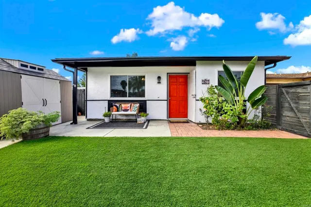 a house view with a garden space