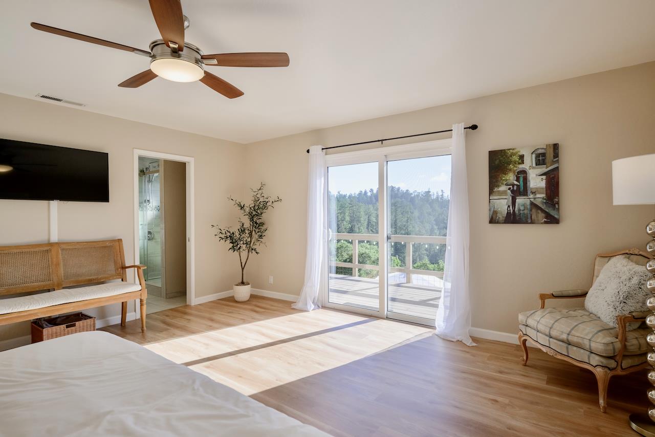 155 Rabbits Run Road Santa Cruz, CA 95060 - Photo 53 of 113 a living room with furniture and a flat screen tv