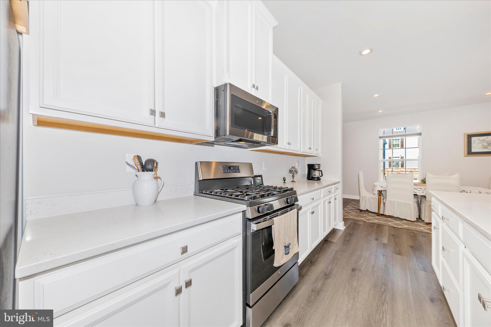 1736 Atlas Drive Frederick, MD 21702 - Photo 15 of 99 a kitchen with stainless steel appliances granite countertop a stove and a sink