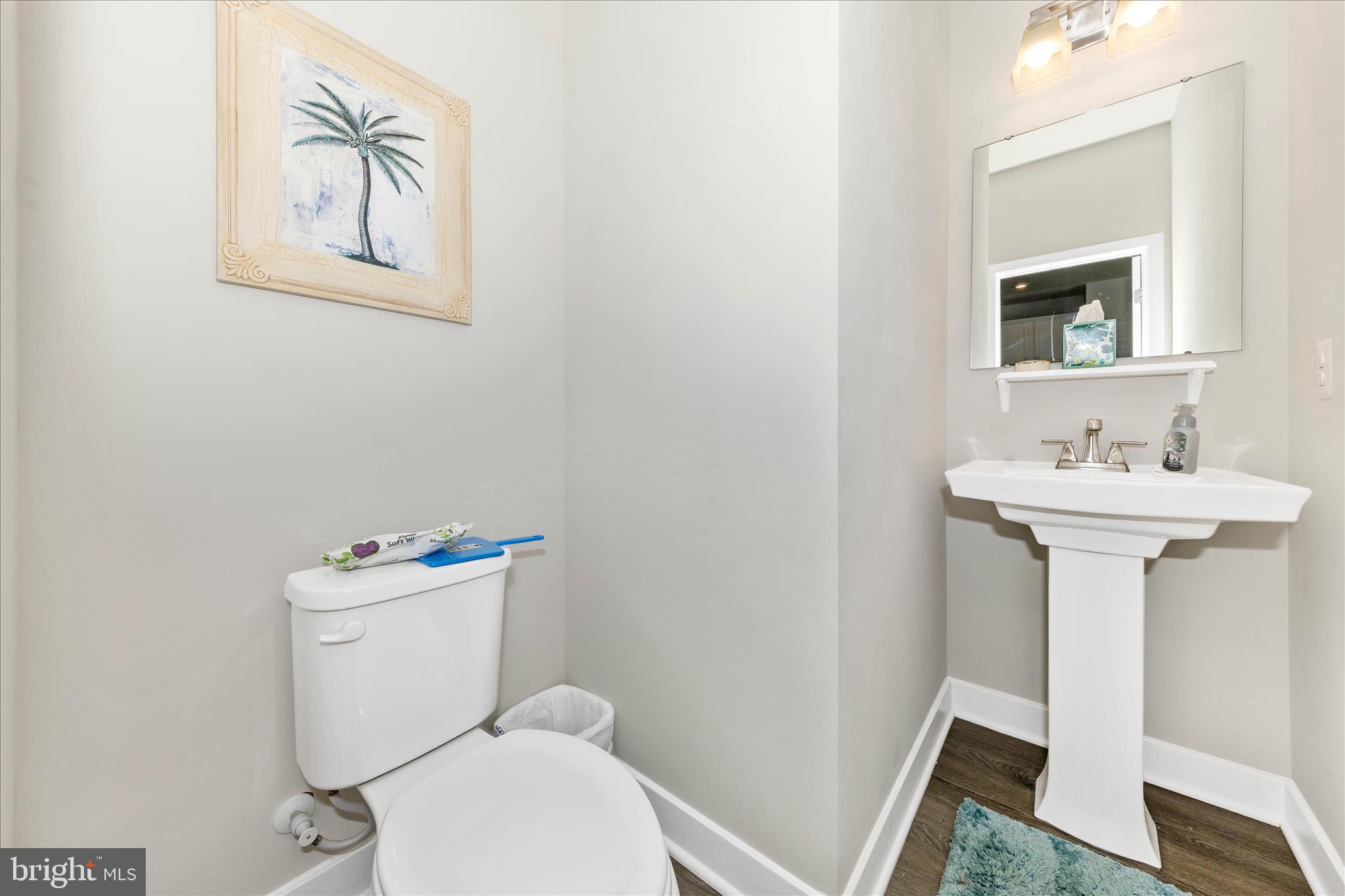 1736 Atlas Drive Frederick, MD 21702 - Photo 23 of 99 a bathroom with a toilet sink and mirror