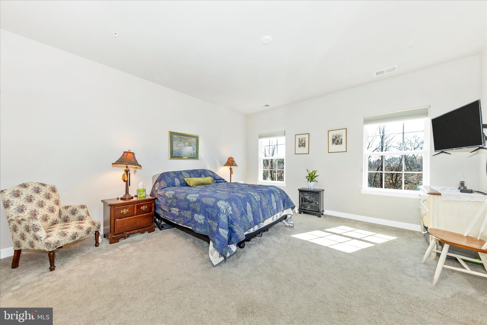 1736 Atlas Drive Frederick, MD 21702 - Photo 25 of 99 a bedroom with a bed and a window