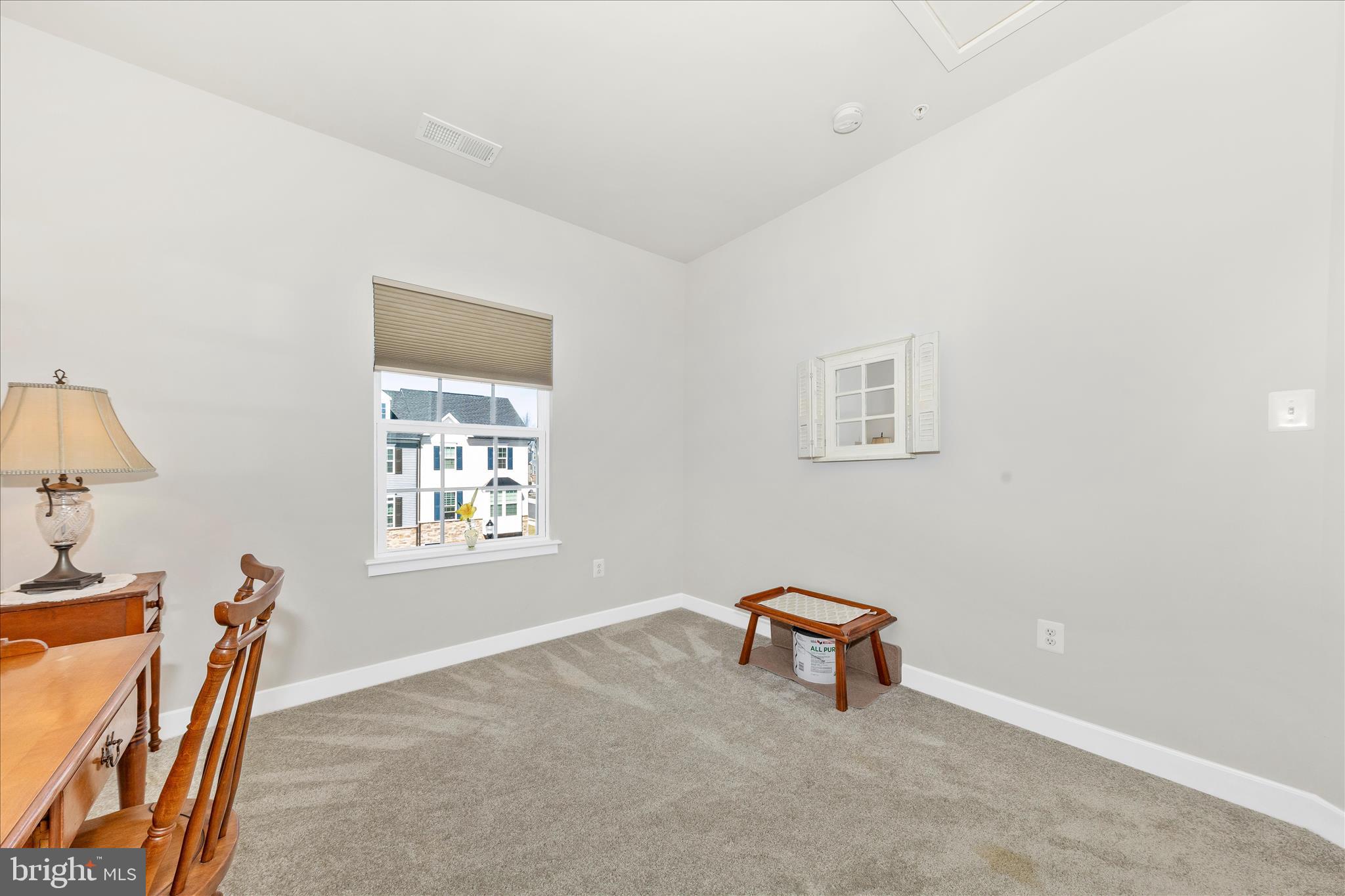 1736 Atlas Drive Frederick, MD 21702 - Photo 34 of 99 a room with a window and a projector