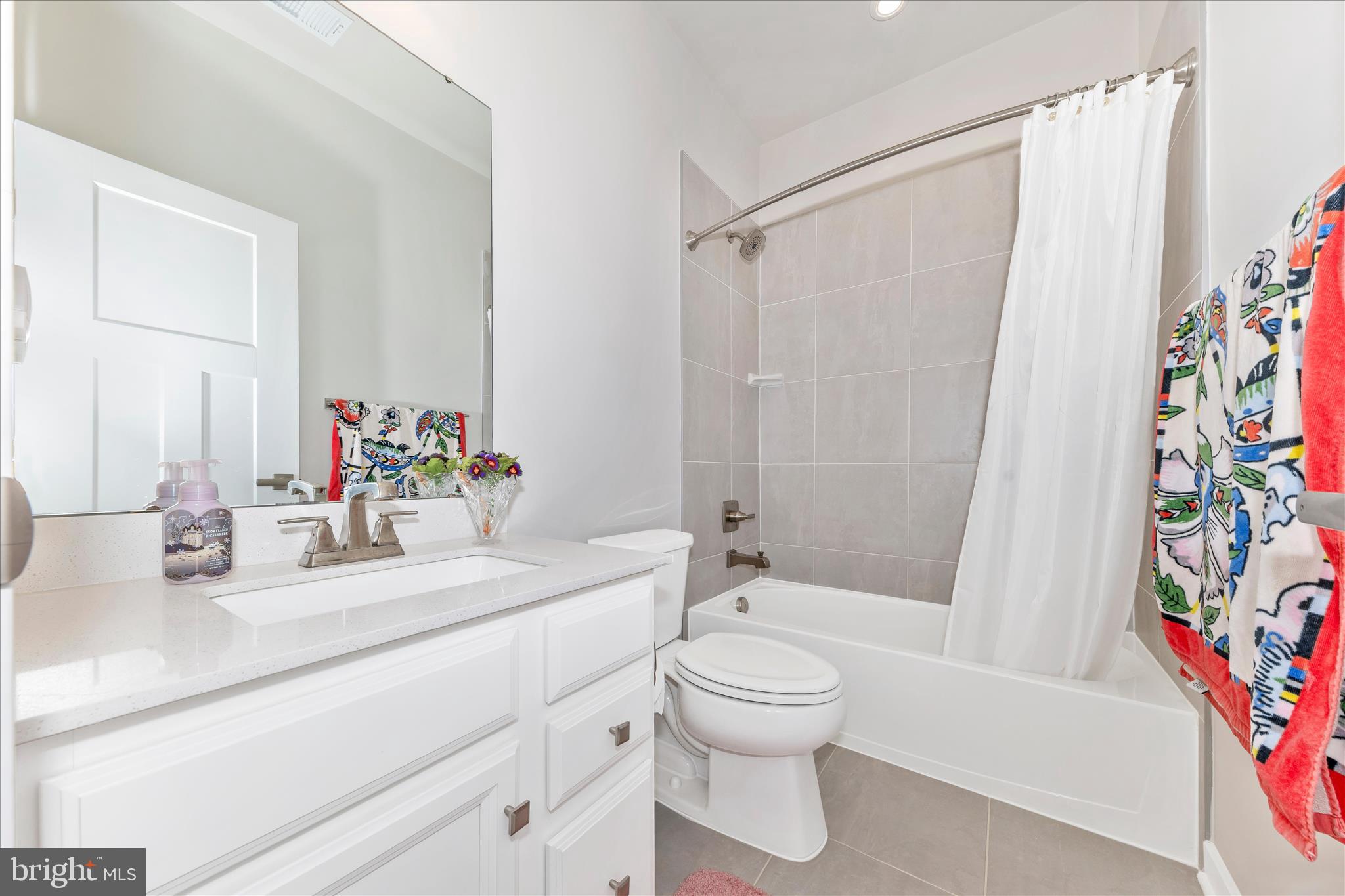 1736 Atlas Drive Frederick, MD 21702 - Photo 35 of 99 a bathroom with a sink toilet and shower