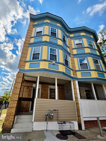 a front view of a multi story residential apartment building