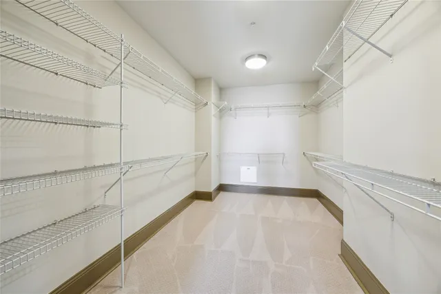 a view of an empty walk in closet