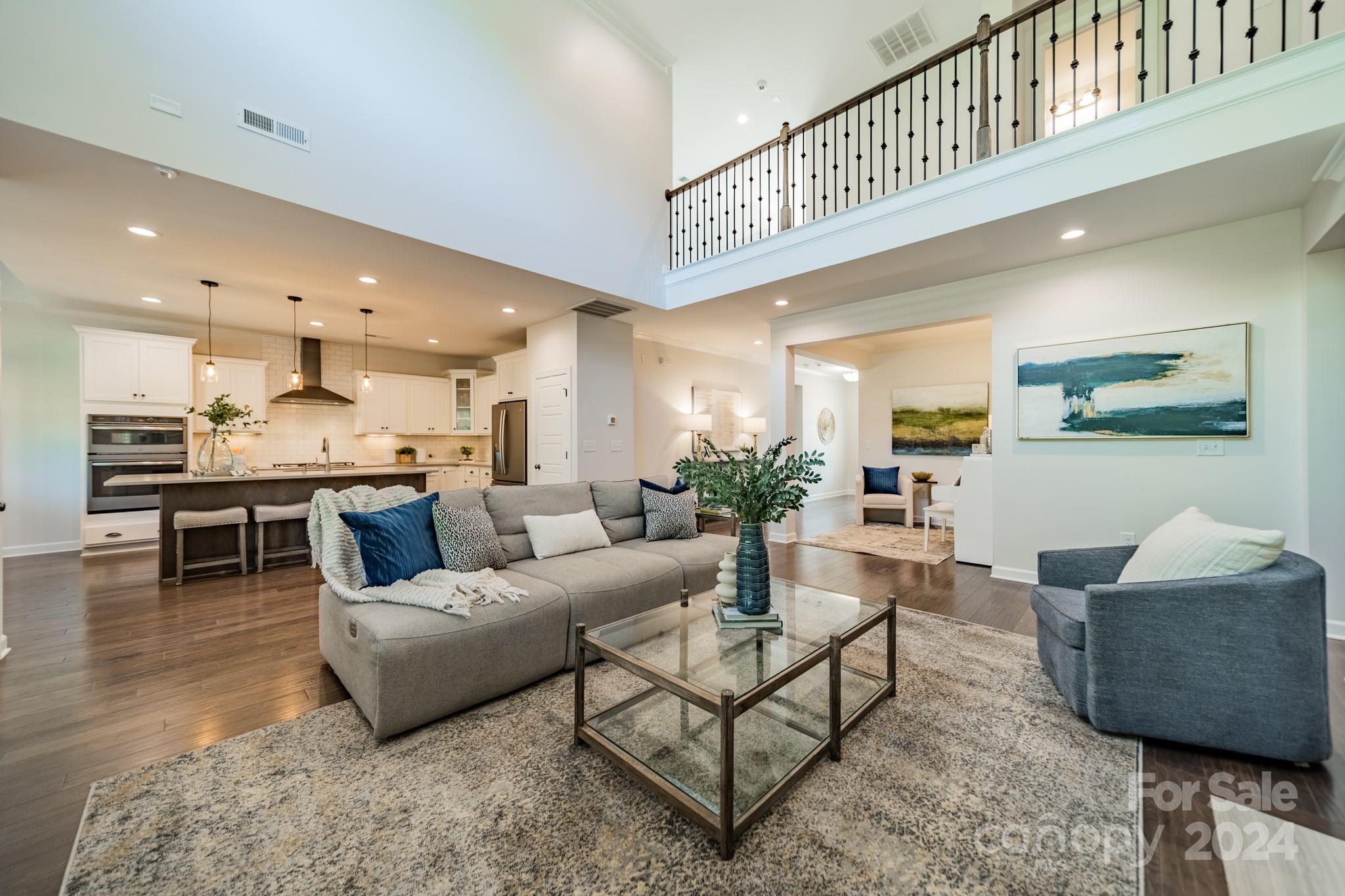 2826 Walker Road Matthews, NC 28105 - Photo 18 of 45 a living room with furniture and kitchen view
