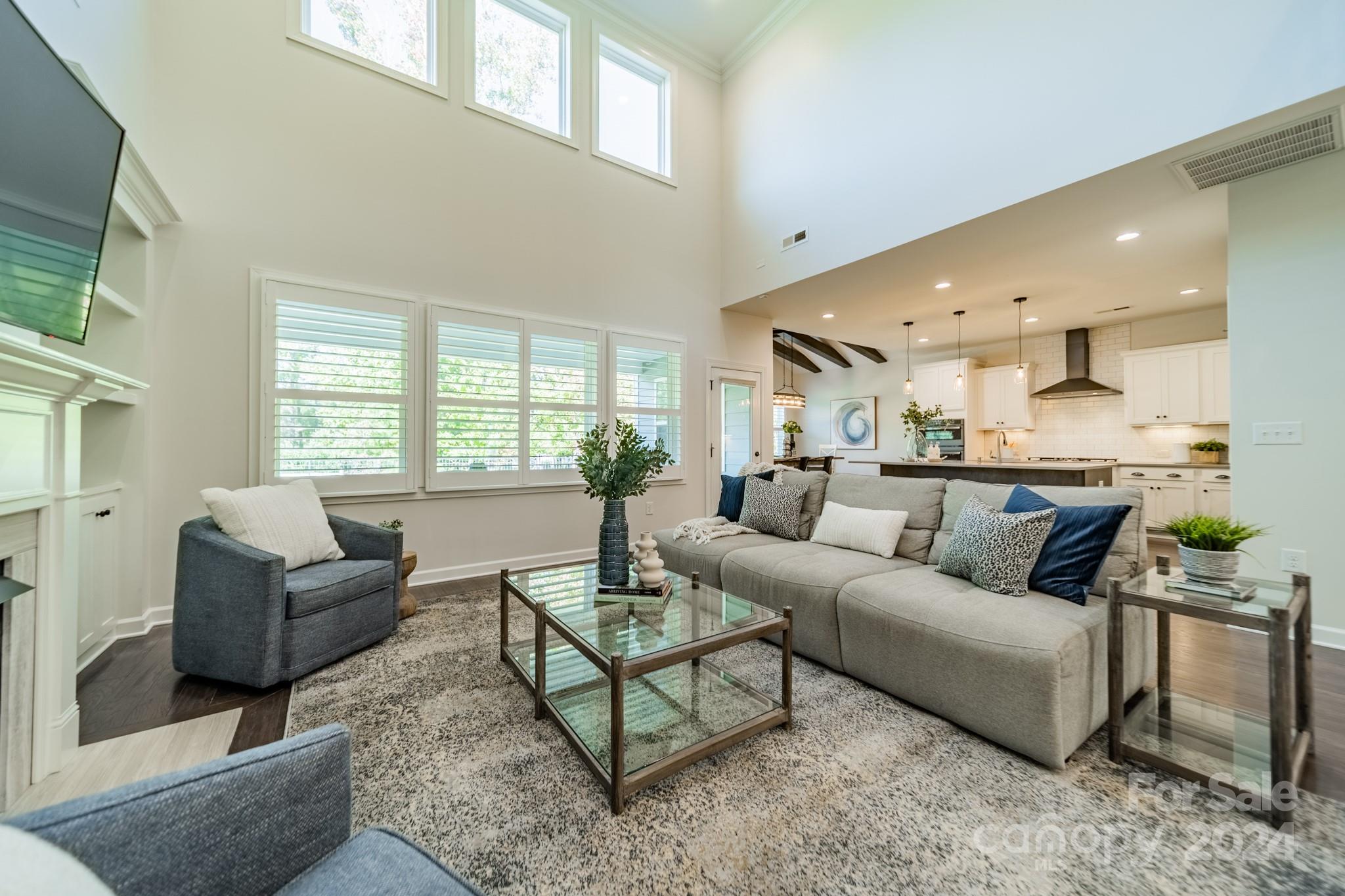 2826 Walker Road Matthews, NC 28105 - Photo 19 of 45 a living room with furniture and a large window