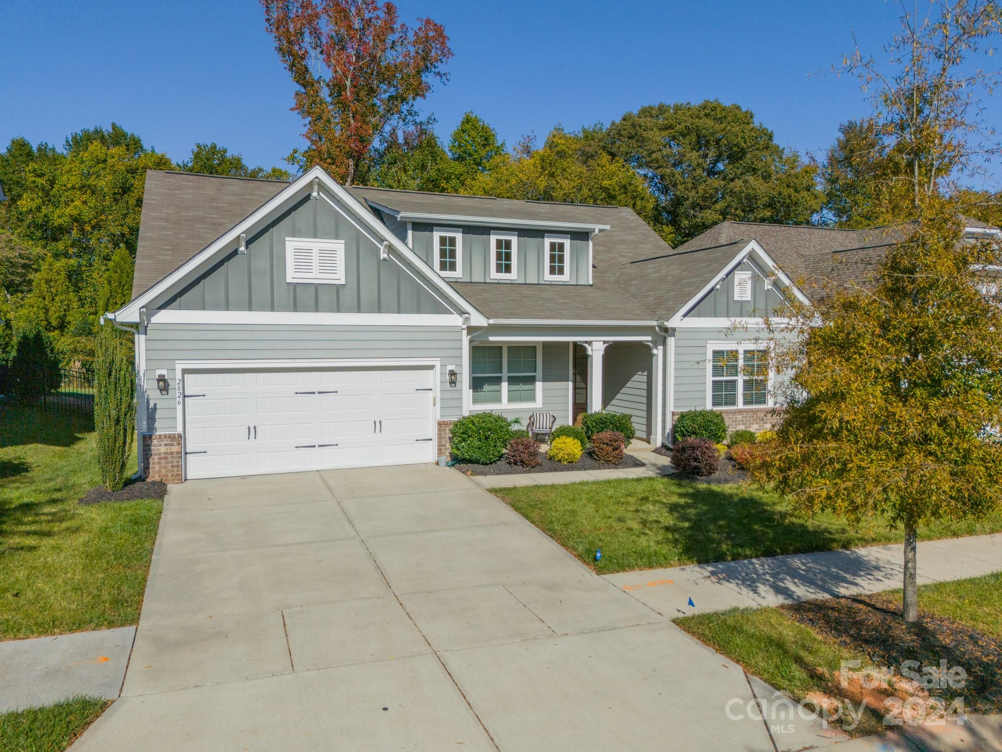 2826 Walker Road Matthews, NC 28105 - Photo 2 of 45 a front view of a house with a yard