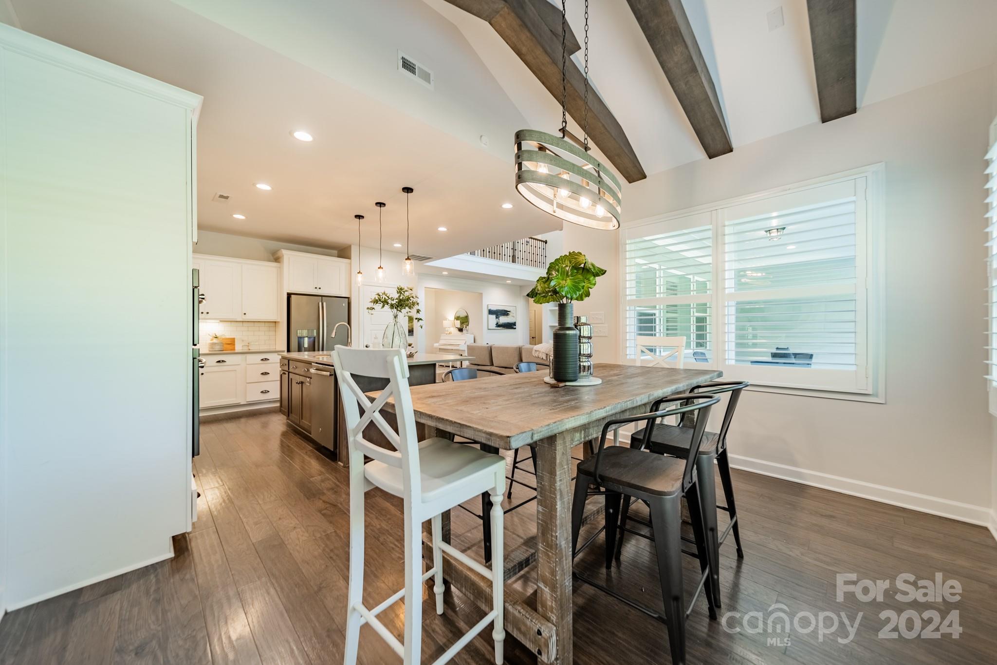 2826 Walker Road Matthews, NC 28105 - Photo 26 of 45 a view of a dining room with furniture and a table