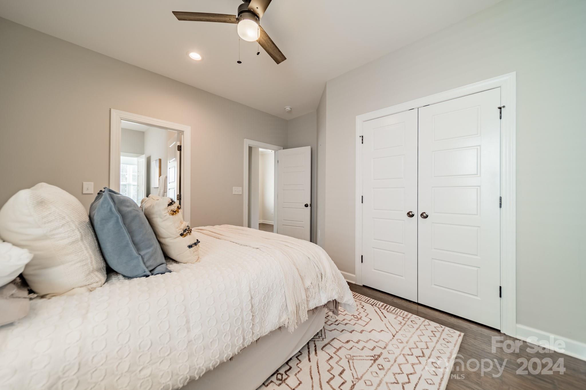 2826 Walker Road Matthews, NC 28105 - Photo 37 of 45 a bedroom with a bed and a window