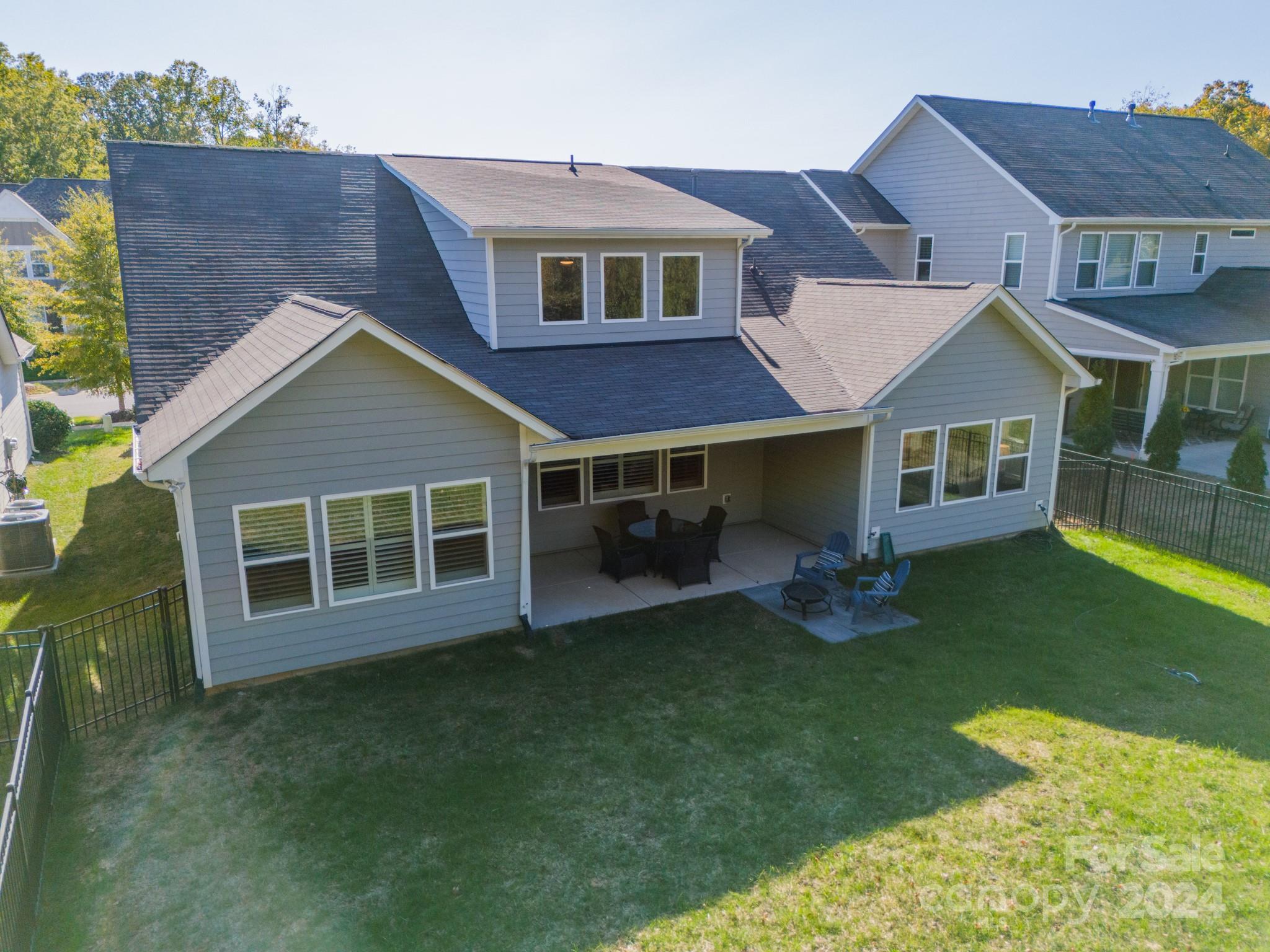 2826 Walker Road Matthews, NC 28105 - Photo 7 of 45 a front view of a house with a garden