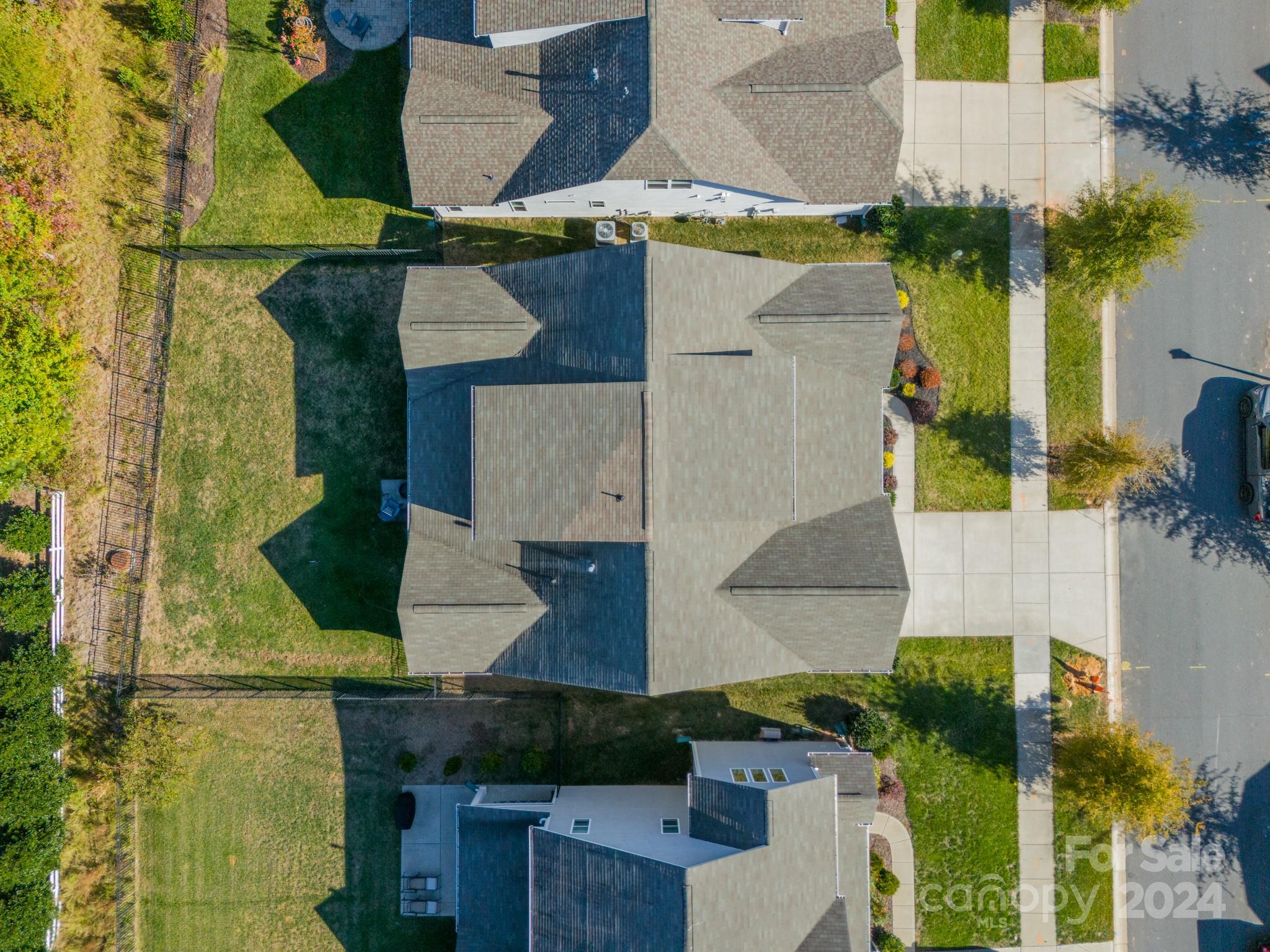 2826 Walker Road Matthews, NC 28105 - Photo 8 of 45 an aerial view of houses with outdoor space