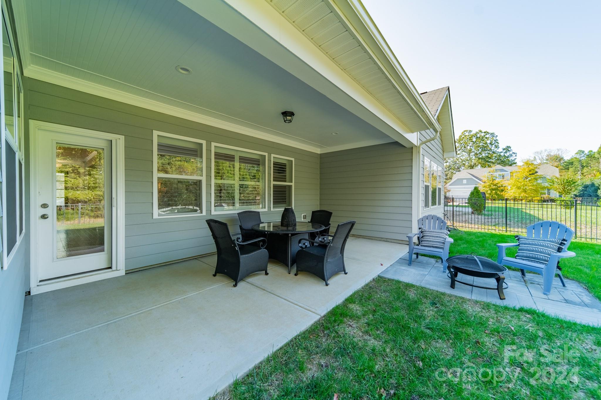 2826 Walker Road Matthews, NC 28105 - Photo 10 of 45 a view of a house with backyard sitting area and garden