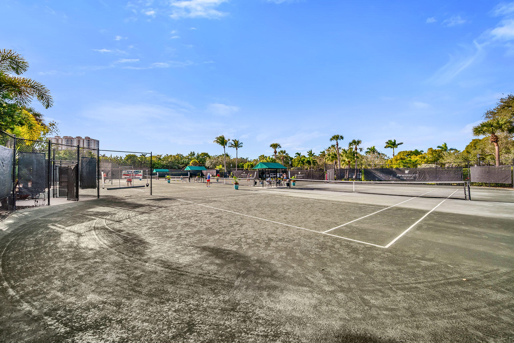 1285 Rialto Way, Unit 102 Naples, FL 34114 - Photo 36 of 49 a view of a basketball court