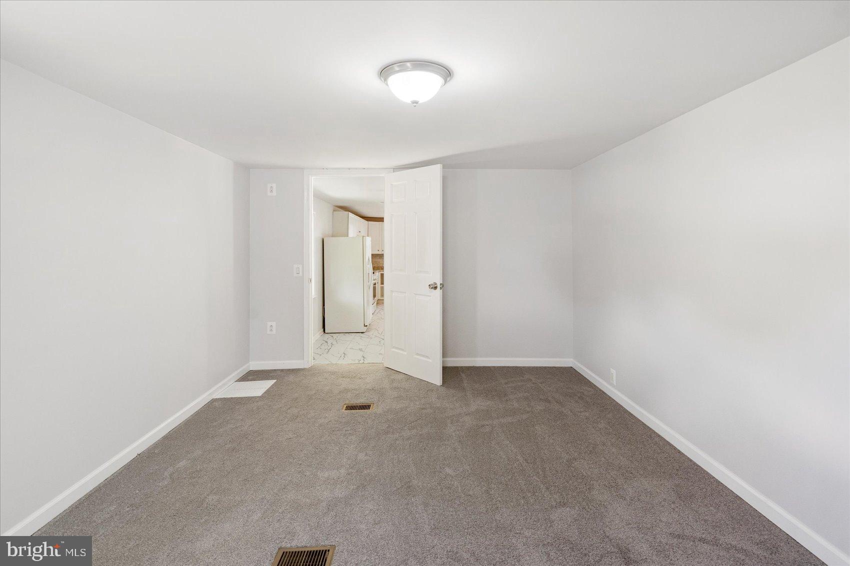 103 Conestoga Road Middle River, MD 21220 - Photo 18 of 27 Spacious room with inviting natural light.