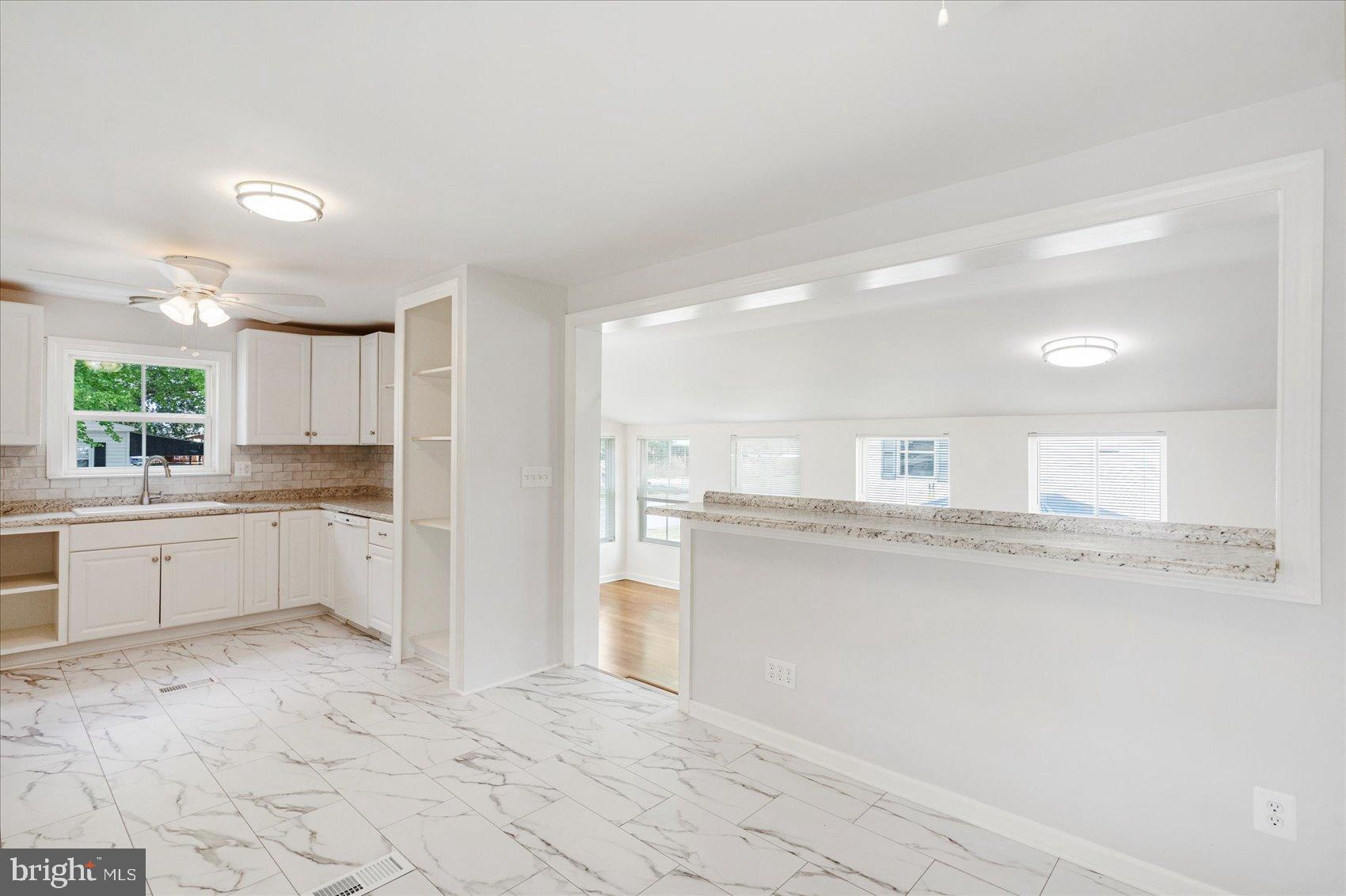 103 Conestoga Road Middle River, MD 21220 - Photo 24 of 27 Bright, airy kitchen with modern finishes.