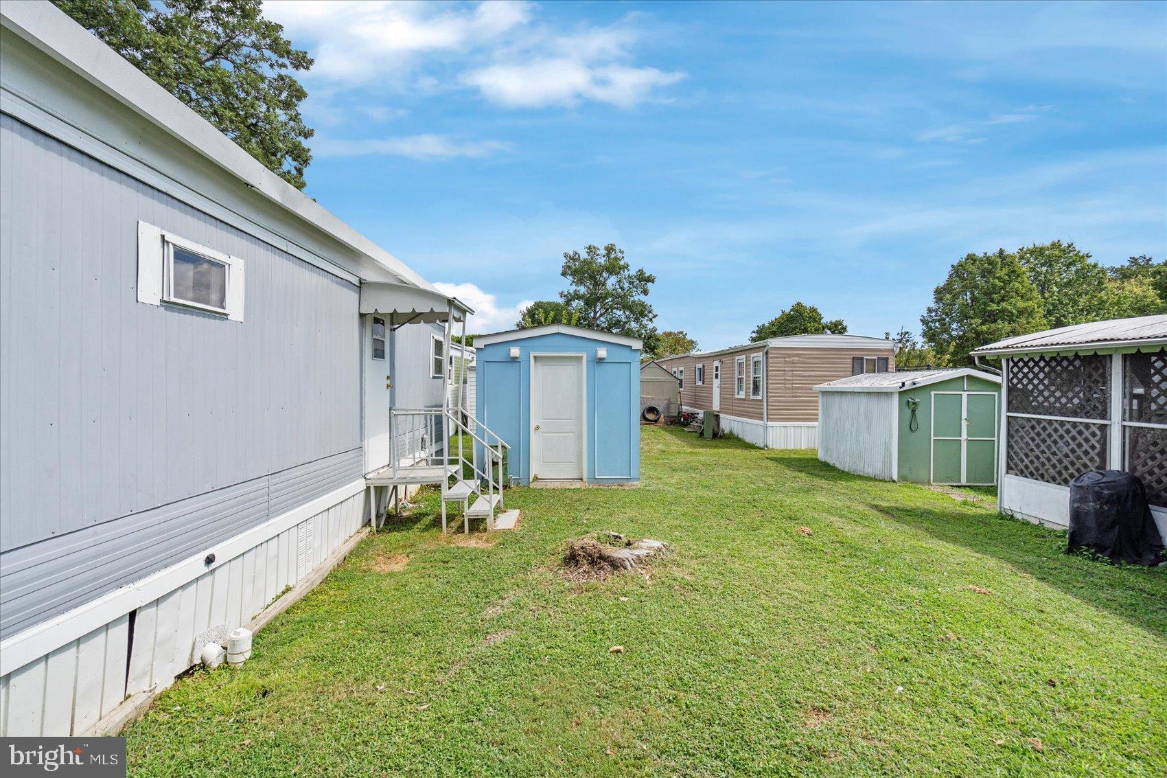 103 Conestoga Road Middle River, MD 21220 - Photo 8 of 27 Charming mobile home community with green space.