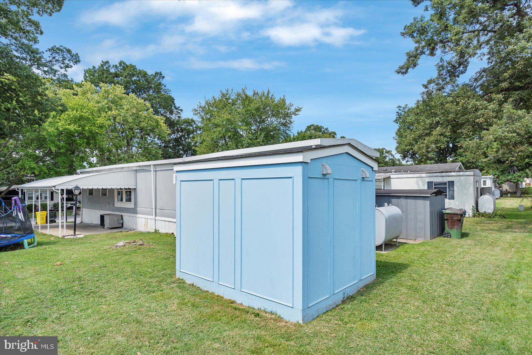 103 Conestoga Road Middle River, MD 21220 - Photo 9 of 27 Charming outdoor space with storage shed.