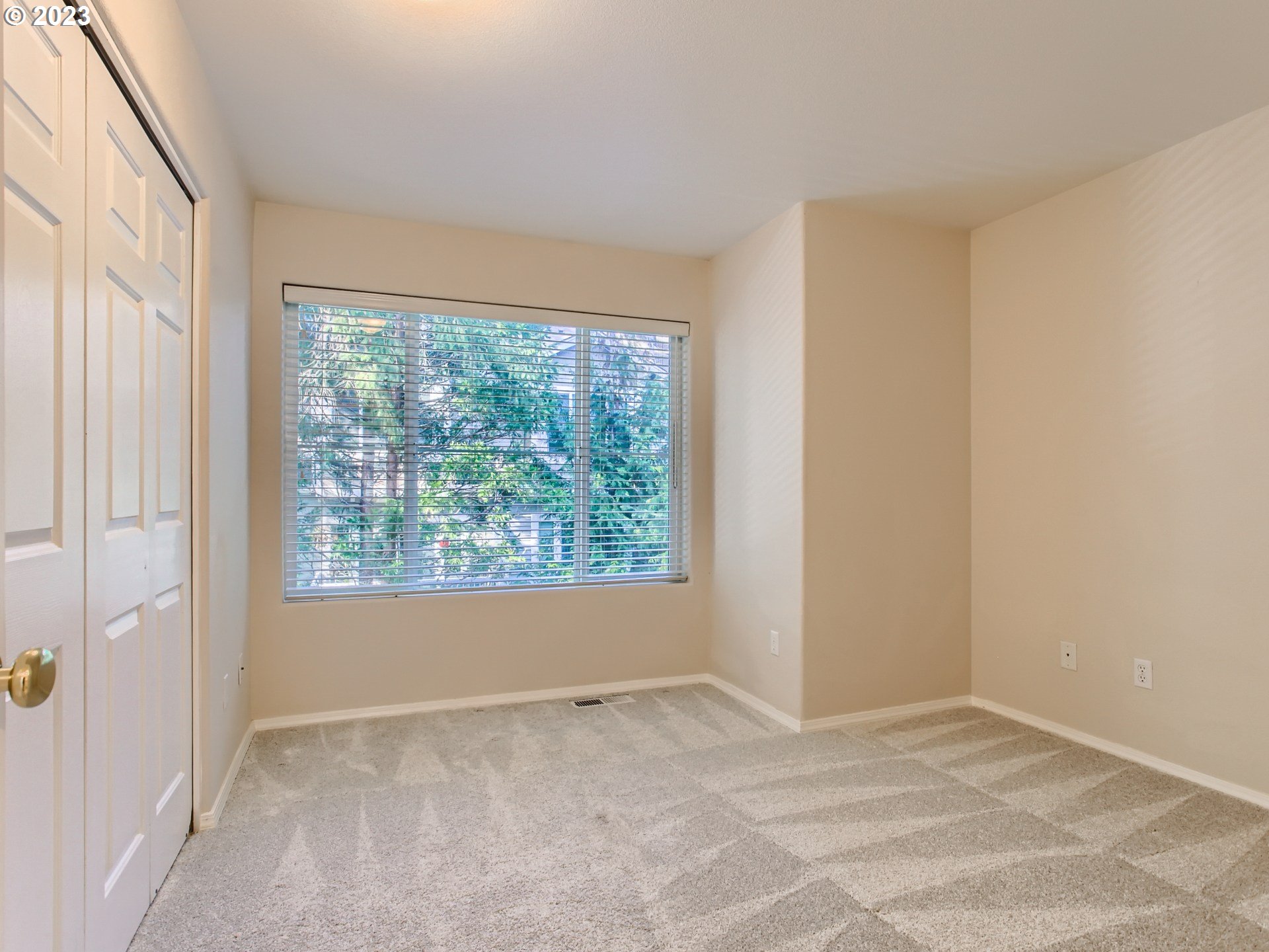 14140 Southwest Barrows Road, Unit 2 Portland, OR 97223 - Photo 19 of 30 a view of an empty room with a window