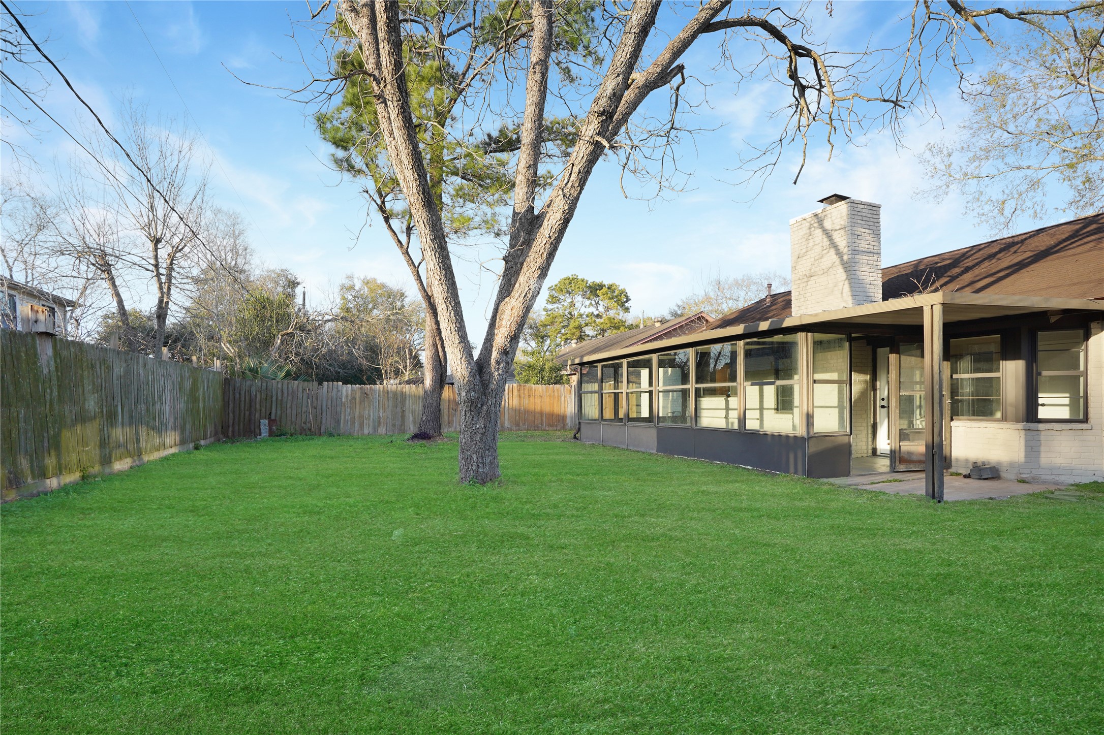 11822 South Perry Avenue Houston, TX 77071 - Photo 23 of 23 a view of a house with a yard