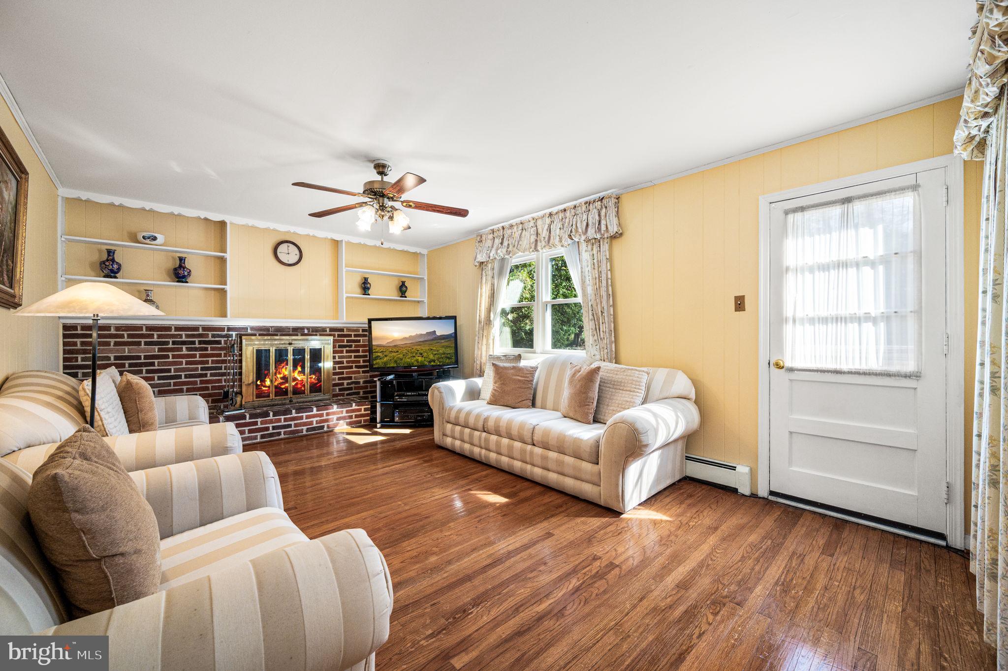 1231 Gail Road West Chester, PA 19380 - Photo 11 of 49 a living room with furniture and a large window