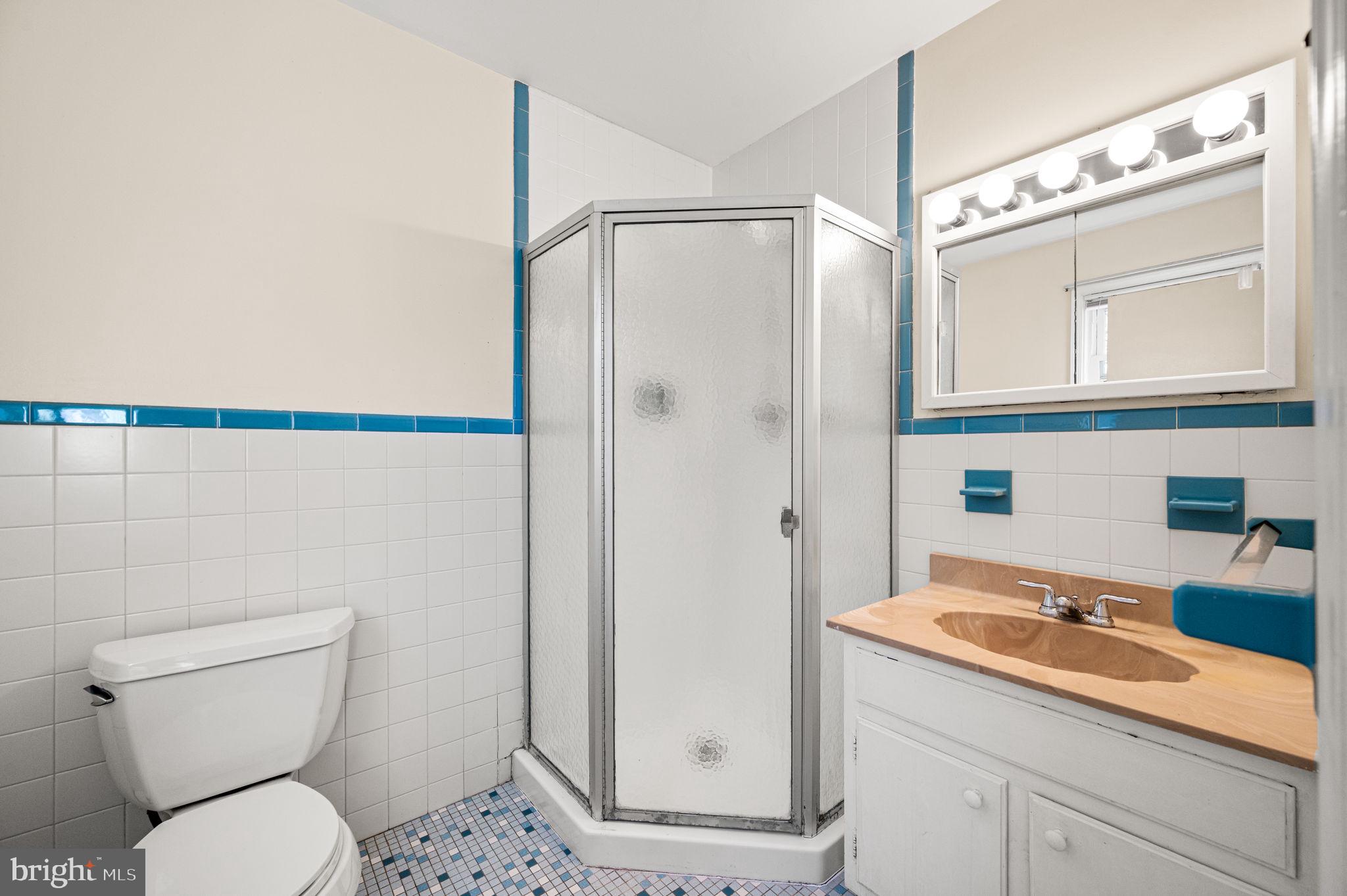 1231 Gail Road West Chester, PA 19380 - Photo 24 of 49 a bathroom with a granite countertop sink toilet and shower