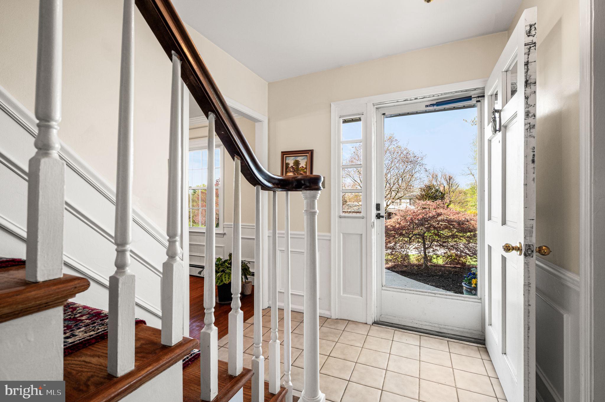 1231 Gail Road West Chester, PA 19380 - Photo 6 of 49 a view of an entryway with wooden floor and door