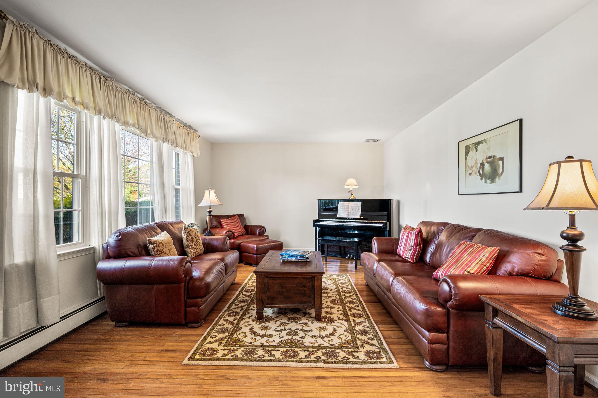 1231 Gail Road West Chester, PA 19380 - Photo 8 of 49 a living room with furniture and a large window