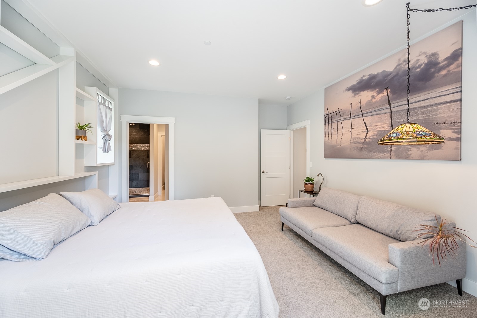 949 Spring Mountain Drive Wenatchee, WA 98801 - Photo 13 of 33 a bedroom with a bed and ceiling fan