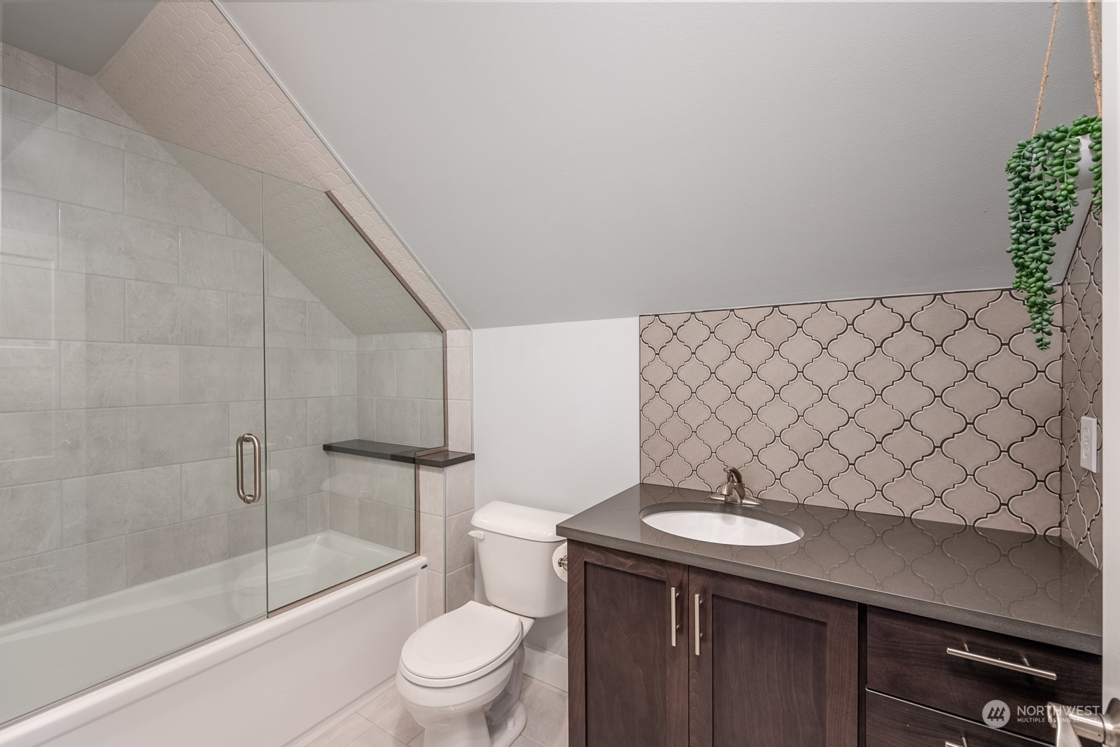 949 Spring Mountain Drive Wenatchee, WA 98801 - Photo 24 of 33 a bathroom with a sink a toilet and shower