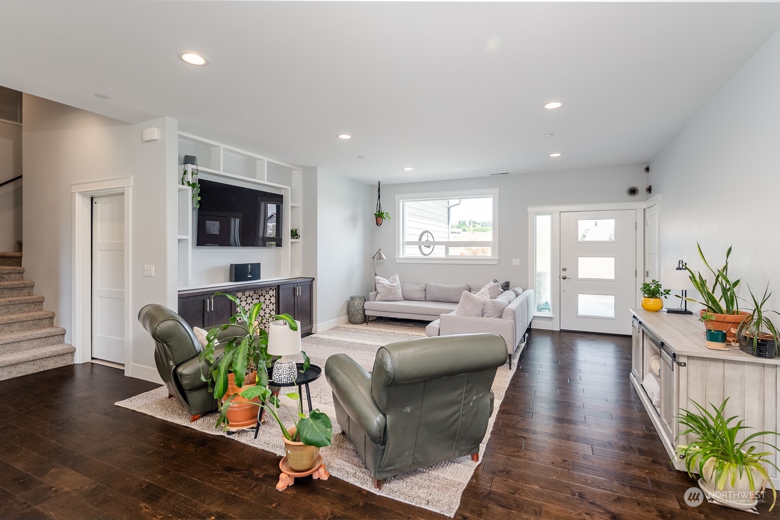 949 Spring Mountain Drive Wenatchee, WA 98801 - Photo 3 of 33 a living room with furniture and a flat screen tv