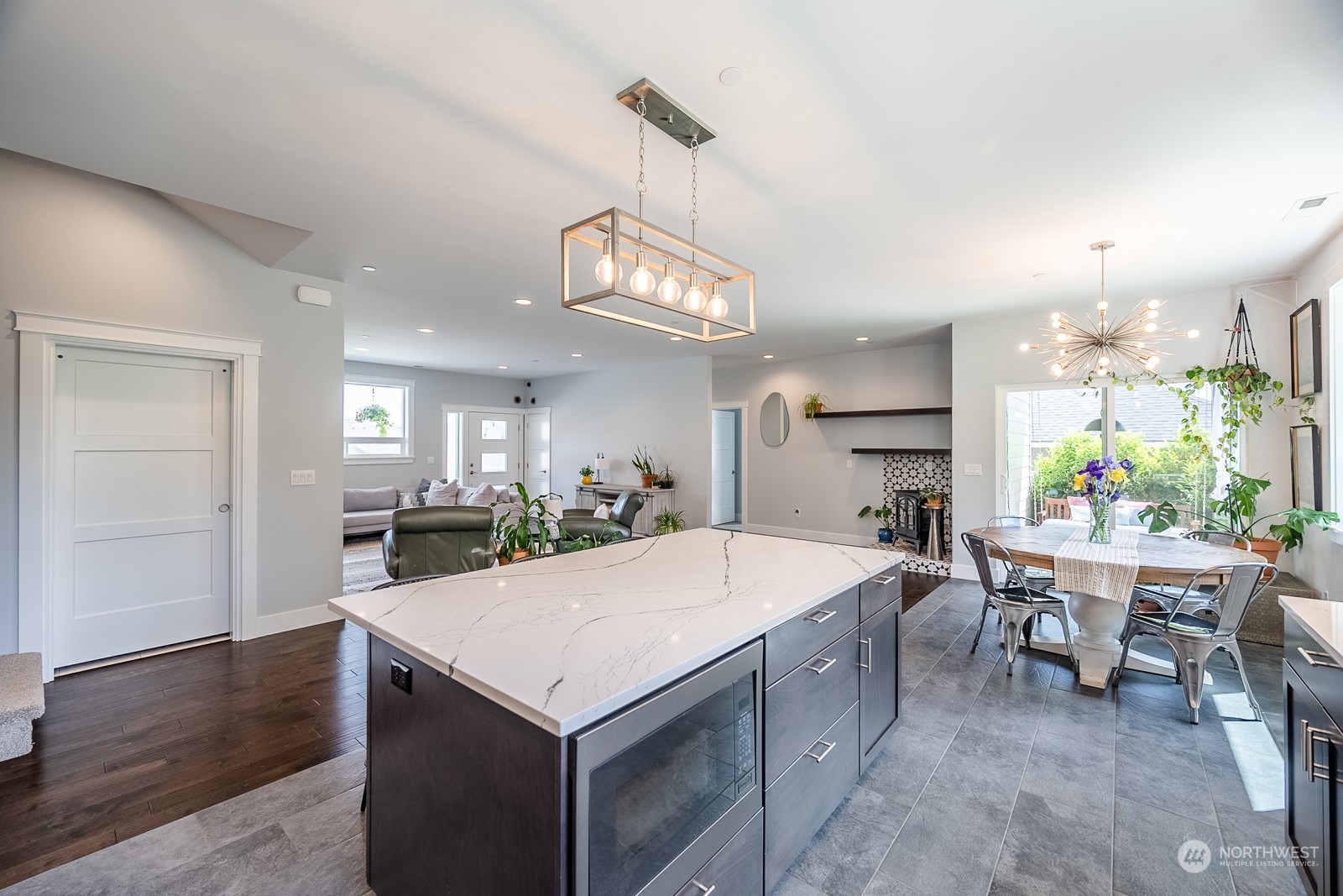 949 Spring Mountain Drive Wenatchee, WA 98801 - Photo 10 of 33 a large kitchen with a table and chairs