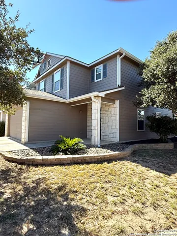 a front view of house with yard