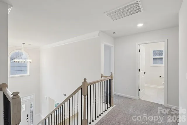 a view of a hallway with closet area