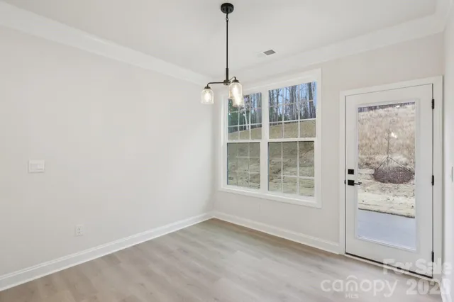 a view of an empty room with window