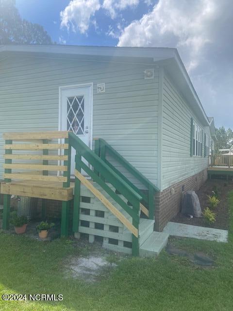 7184 Hunters Ridge Drive Leland, NC 28451 - Photo 15 of 19 Side Entry Deck