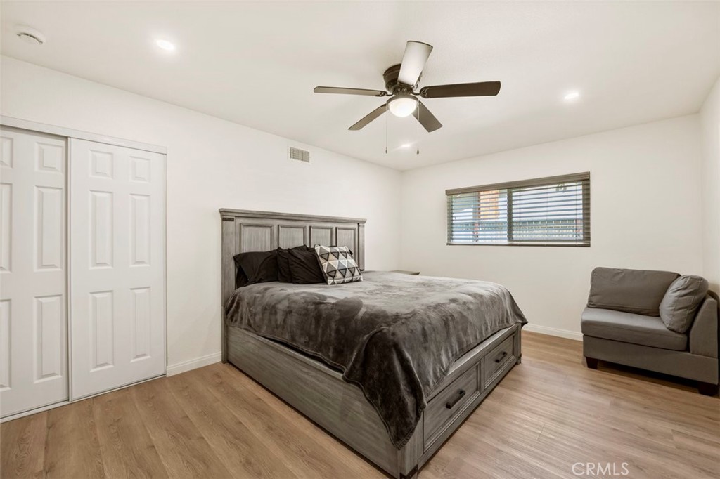 332 Cadillac Circle Oceanside, CA 92054 - Photo 16 of 31 a bedroom with a bed couch and window