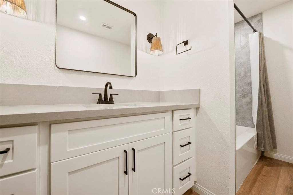 332 Cadillac Circle Oceanside, CA 92054 - Photo 20 of 31 a bathroom with a sink and a mirror