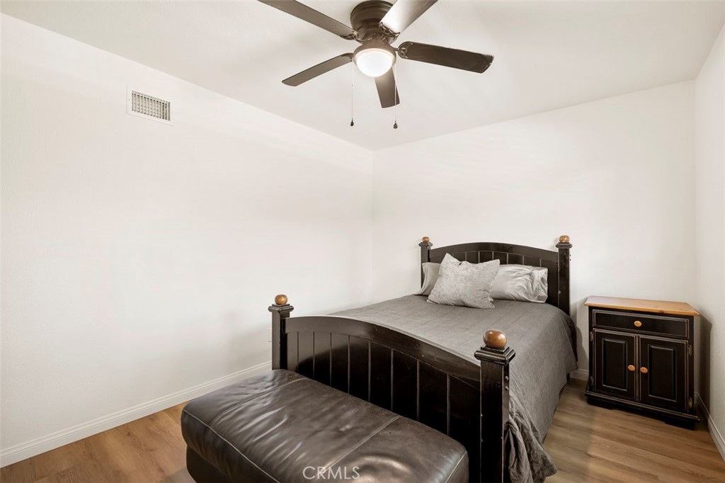 332 Cadillac Circle Oceanside, CA 92054 - Photo 24 of 31 a bedroom with a bed and a tv