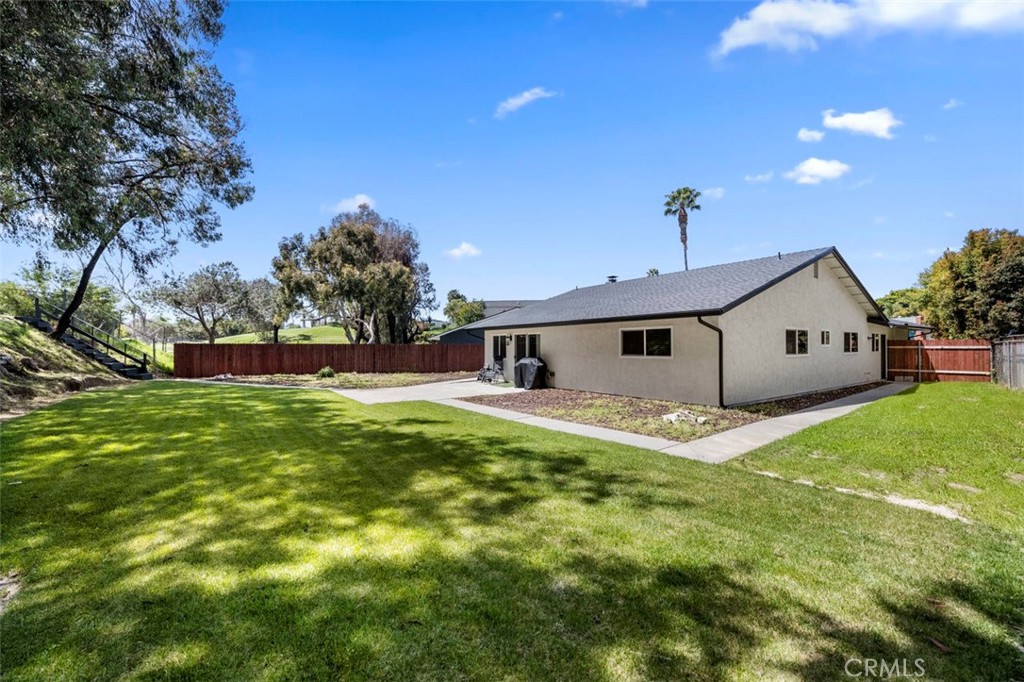 332 Cadillac Circle Oceanside, CA 92054 - Photo 28 of 31 a front view of a house with garden