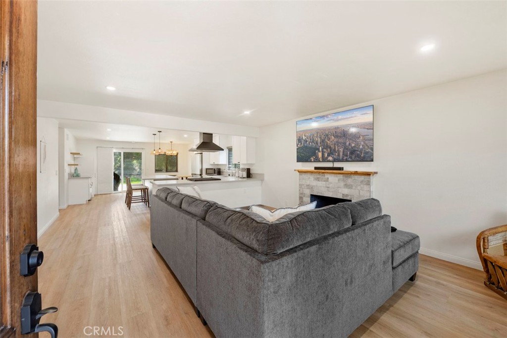 332 Cadillac Circle Oceanside, CA 92054 - Photo 4 of 31 a living room with furniture and a flat screen tv