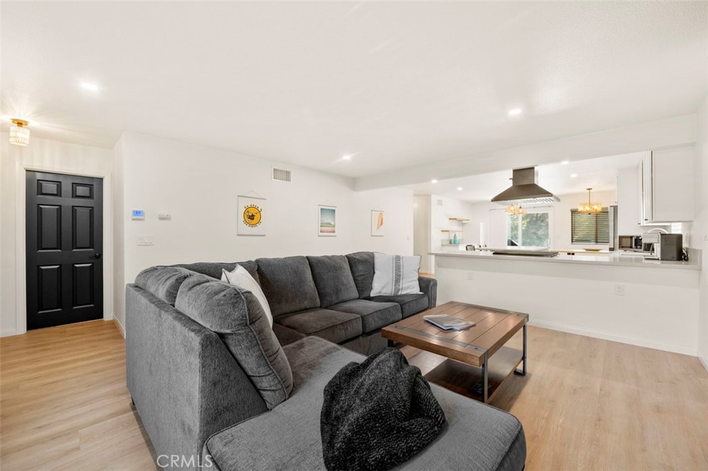 332 Cadillac Circle Oceanside, CA 92054 - Photo 5 of 31 a living room with furniture and wooden floor