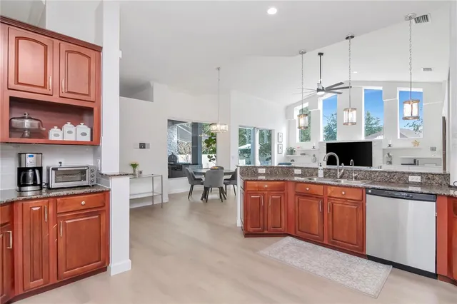 a kitchen with granite countertop lots of counter top space