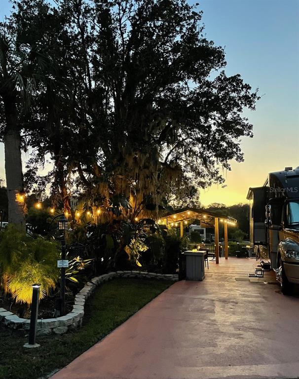 568 Waterway Drive River Ranch, FL 33867 - Photo 20 of 21 a view of outdoor space with garden view