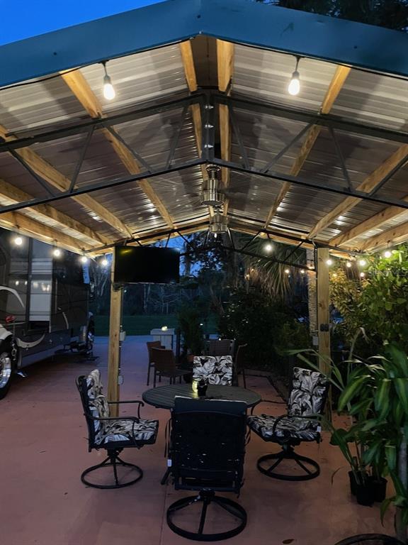 568 Waterway Drive River Ranch, FL 33867 - Photo 21 of 21 a view of a chairs and tables in patio