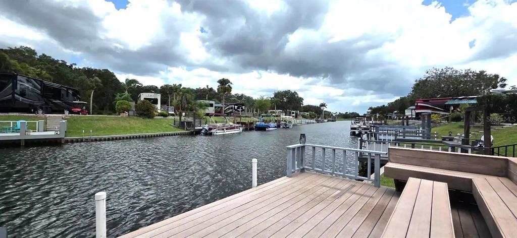568 Waterway Drive River Ranch, FL 33867 - Photo 9 of 21 a view of a lake with a house