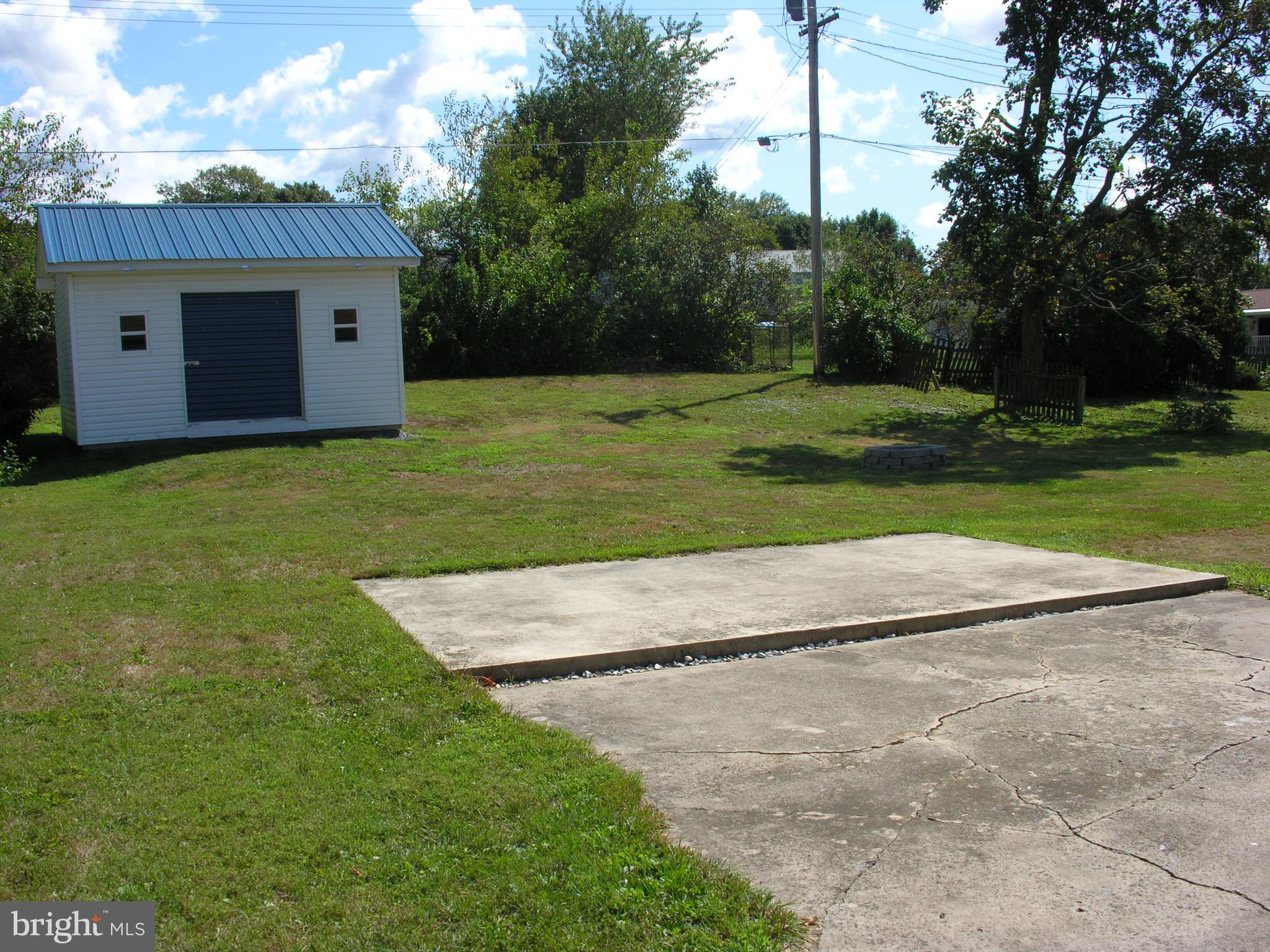 206 Ritchey Road Fayetteville, PA 17222 - Photo 7 of 17 Backyard patio with shed