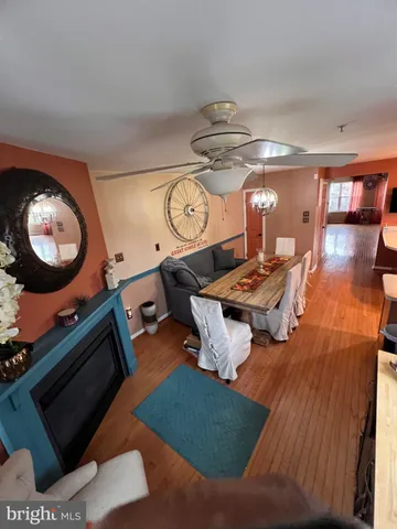 a workspace with furniture and wooden floor