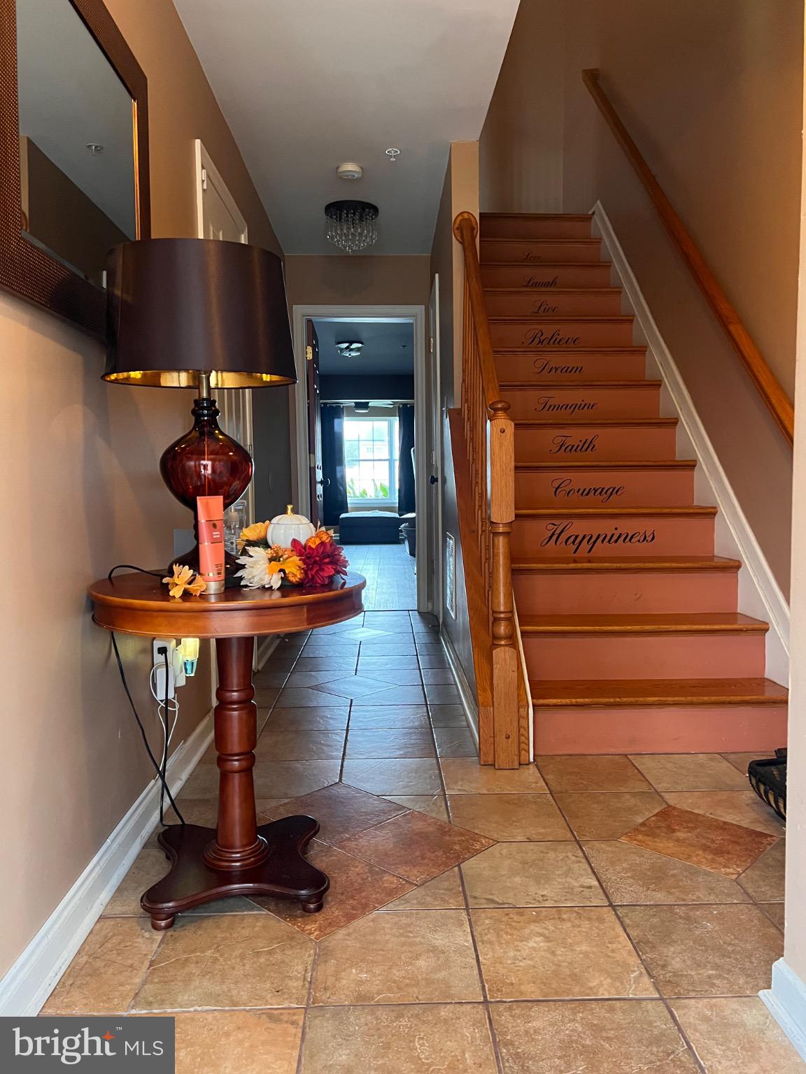 103 Canvasback Way Cambridge, MD 21613 - Photo 2 of 39 a dining room with furniture and entryway