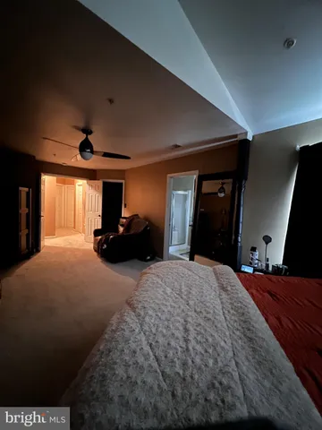 a view of storage and utility room with washer and dryer